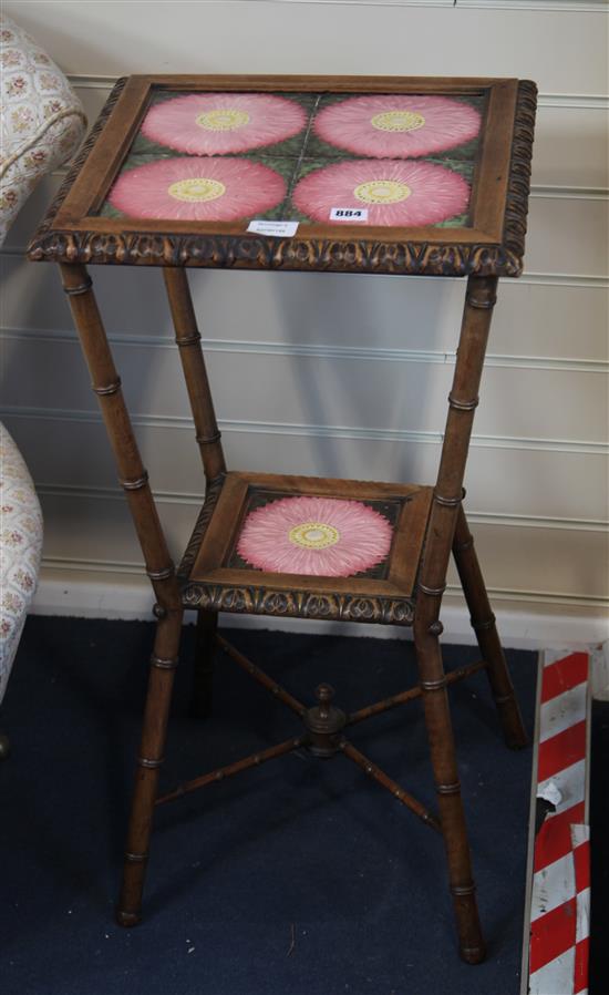 A Victorian carved mahogany tile top table, h.76CM